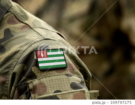 Flag of Republic of Abkhazia on military uniform. Army, armed forces, soldiers. Collage. Flag of Republic of Abkhazia on military uniform. Army, armed forces, soldiers. Collage. 109797275