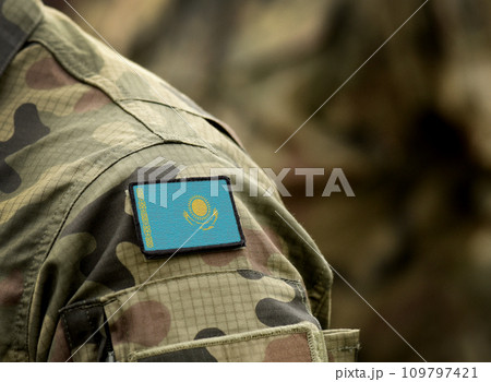 Flag of Kazakhstan on military uniform. Army, armed forces, soldiers. Collage. Flag of Kazakhstan on military uniform. Army, armed forces, soldiers. Collage. 109797421