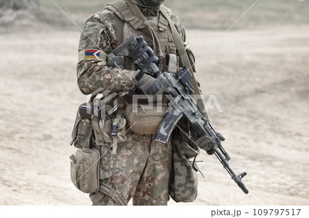Soldier with assault rifle and flag of Artsakh and also known as Nagorno-Karabakh Republic. Collage. 109797517