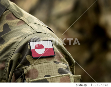 Flag of Greenland on military uniform. Army, armed forces, soldiers. Collage. 109797858