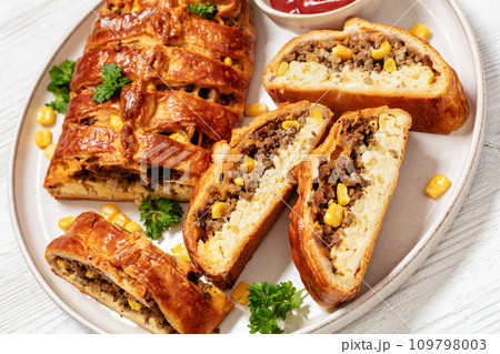 Breakfast Braid with ground beef, eggs, top view Breakfast Braid with ground beef, eggs, top view 109798003