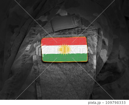 Flag of Kurdistan on soldiers arm. Flag of Kurdistan on military uniforms (collage). Flag of Kurdistan on soldiers arm. Flag of Kurdistan on military uniforms (collage). 109798333