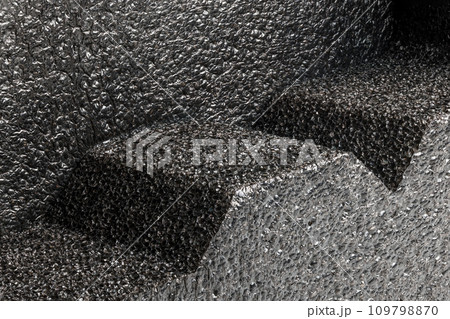 Black high-impact closed-cell polyethylene black foam sheets cut. Specifically designed packing material. 109798870