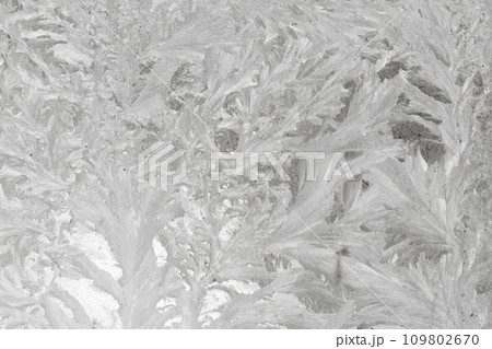 Frosty patterns on glass Frosty patterns on glass 109802670