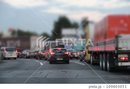 Transport standing in traffic jam at night. Busy traffic jam with cars in evening city 109803051