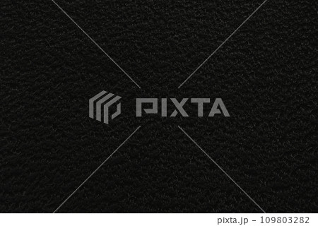 texture of a dark finely uneven stone surface as a background or web banner 109803282