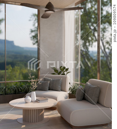 A modern living room with a comfy chairs, a coffee table, a ceiling fan, and large glass window. 109809574