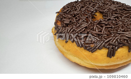 Delicious doughnut, sweet chocolate donut on white background freshly made donut 109810460