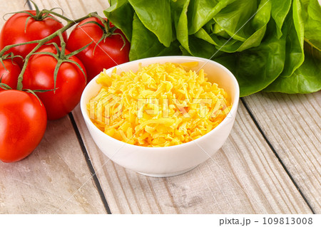 Shredded cheese in the bowl Shredded cheese in the bowl 109813008