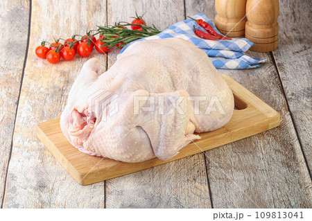 Whole raw chicken for cooking 109813041