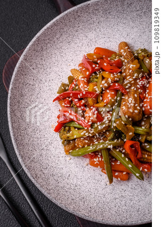 Mix of vegetables corn, carrots, peppers, broccoli, onions in teriyaki sauce Mix of vegetables corn, carrots, peppers, broccoli, onions in teriyaki sauce 109819349
