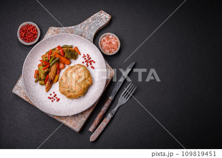 Delicious fresh fried minced fish cutlets with spices and herbs 109819451