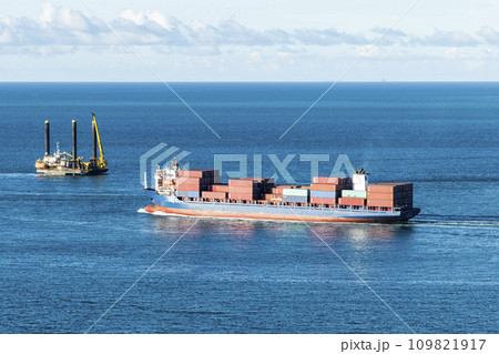 The container ship is leaving the Port of Keelung, Taiwan. 109821917