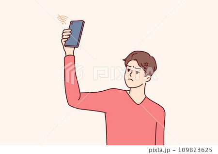Bad wifi connection causes sadness in man, who lifts phone up and wants to connect to internet 109823625