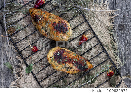 Grilled spicy chicken breast .Top view. Flat lay 109823972