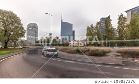 Panorama showing skyscrapers and towers from park with green lawn timelapse in Milan Panorama showing skyscrapers and towers from park with green lawn timelapse in Milan 109827276