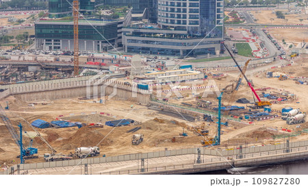 Foundation pit for construction of apartment complex building aerial timelapse in UAE Foundation pit for construction of apartment complex building aerial timelapse in UAE 109827280