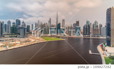Aerial view to Dubai Business Bay and Downtown with the various skyscrapers and towers timelapse 109827282