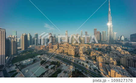 Dubai Downtown night to day timelapse with tallest skyscraper and other towers Dubai Downtown night to day timelapse with tallest skyscraper and other towers 109827370