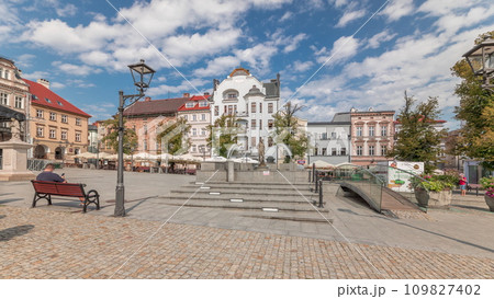 Panorama showing Neptune fountain on Old Town Market Square timelapse with historical houses around. Panorama showing Neptune fountain on Old Town Market Square timelapse with historical houses around. 109827402