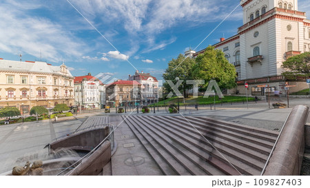 Panorama showing Sulkowski Castle and fountain on Chrobry Square in Bielsko-Biala timelapse, Poland. 109827403
