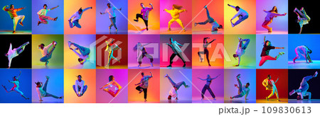 Banner. Contemporary creative set made of talented young people, dancers, men and woman, dancing freestyle in motion in neon light Banner. Contemporary creative set made of talented young people, dancers, men and woman, dancing freestyle in motion in neon light 109830613