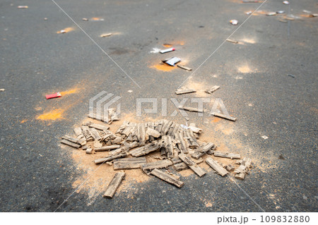 Fireworks rocket launcher box trash remains on german city street after Silvester party traditional celebration. Spoiled firecrackers waste rubbish european Germany town sidewalk Christmas New year Fireworks rocket launcher box trash remains on german city street after Silvester party traditional celebration. Spoiled firecrackers waste rubbish european Germany town sidewalk Christmas New year 109832880