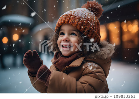Smiling Mixed Race Toddler in City, Festive Snowfall, Christmas Joy and Winter Delights. created with Generative AI 109833263