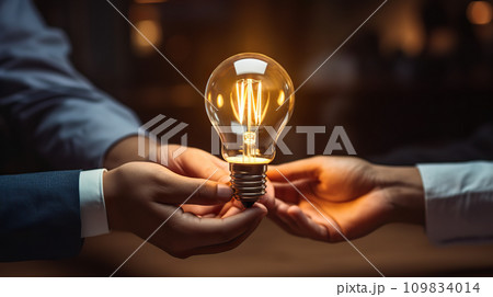 Businessman Holding Light Bulb in Office, Exemplifying Teamwork and Creative Ideation. created with Generative AI Businessman Holding Light Bulb in Office, Exemplifying Teamwork and Creative Ideation. created with Generative AI 109834014