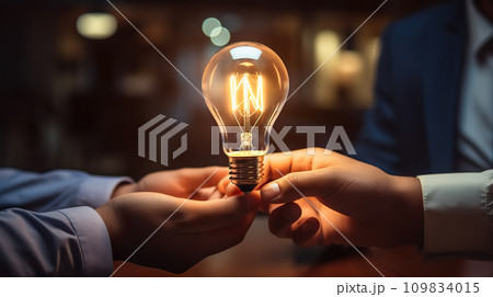 Businessman Holding Light Bulb in Office, Exemplifying Teamwork and Creative Ideation. created with Generative AI 109834015