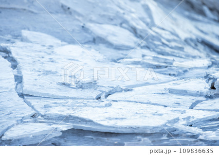 Broken ice shards lay on the coast of Baltic Sea Broken ice shards lay on the coast of Baltic Sea 109836635