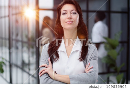 Confident young woman in a closed pose. Office professions 109836905