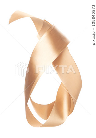 Gold ribbon long straight fly in air with curve roll shiny. Golden ribbon for present gift birthday party to wrap around decorate and make of textile cloth long straight. White background isolated 109840873