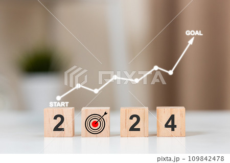 2024 goals business concept. Wooden cubes with Text 2024 with hand  goal icon.  109842478