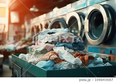 clothes in basket at laundry shop with Modern washing machine .Generative AI 109843087