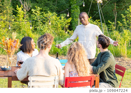 The Host's Welcome: A Gathering Under the Garden Lights 109847224