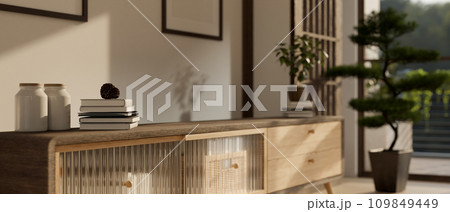 Close-up image of a classic minimal vintage wooden cabinet or TV cabinet in a room. 109849449