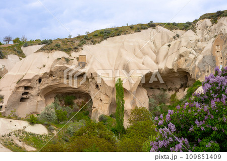 Rock sandstone wall of an ancient house of Cappadocia. Beautiful texture of the wall of an ancient cave dwelling. 109851409