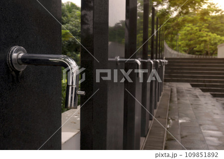 A row of water tap ablution places for Muslims 109851892