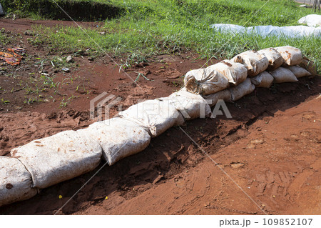 Stacked sandbags Stacked sandbags 109852107