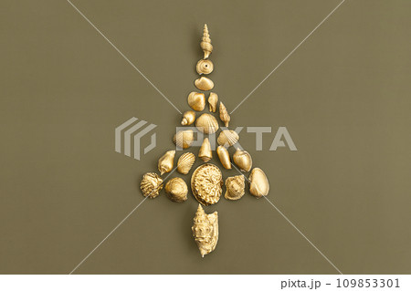 Christmas tree made from golden shells. Christmas tree made from golden shells. 109853301