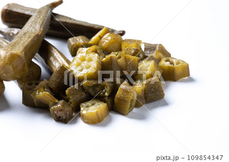 Okra slices isolated on white background. Close up Okra slices isolated on white background. Close up 109854347