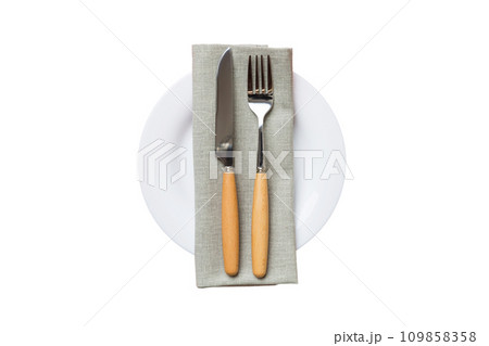 isolated christmas Plate with decor and fork and spoon. New year holiday background. Top view 109858358