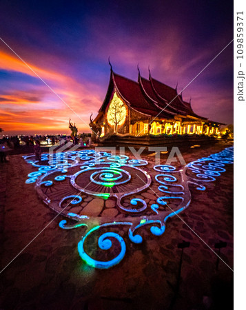 Wat Sirindhorn Wararam glowing temple in Ubon, Thailand 109859371