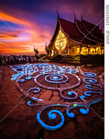 Wat Sirindhorn Wararam glowing temple in Ubon, Thailand 109859398