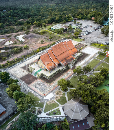 Aerial view of Wat Sirindhorn Wararam glowing temple in Ubon, Thailand 109859404