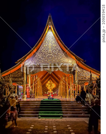 Wat Sirindhorn Wararam glowing temple in Ubon, Thailand 109859418
