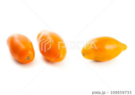Three yellow tomatoes isolated on white background with clipping path. . Three yellow tomatoes isolated on white background with clipping path. . 109859733