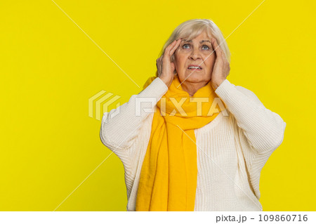 Senior woman rubbing temples to cure headache problem suffering from tension migraine stress pain Senior woman rubbing temples to cure headache problem suffering from tension migraine stress pain 109860716