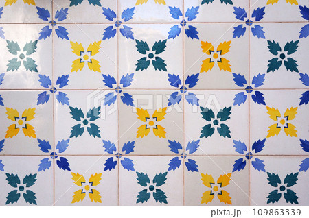 Traditional Azulejo Tiles on a Wall of Buildings in Lisbon, Portugal. 109863339